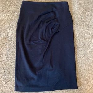 Black knee-length pencil skirt
